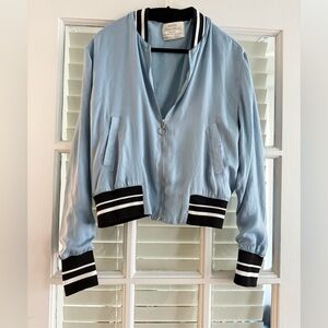 Bershka light blue jacket with black and white stripes, zip front.